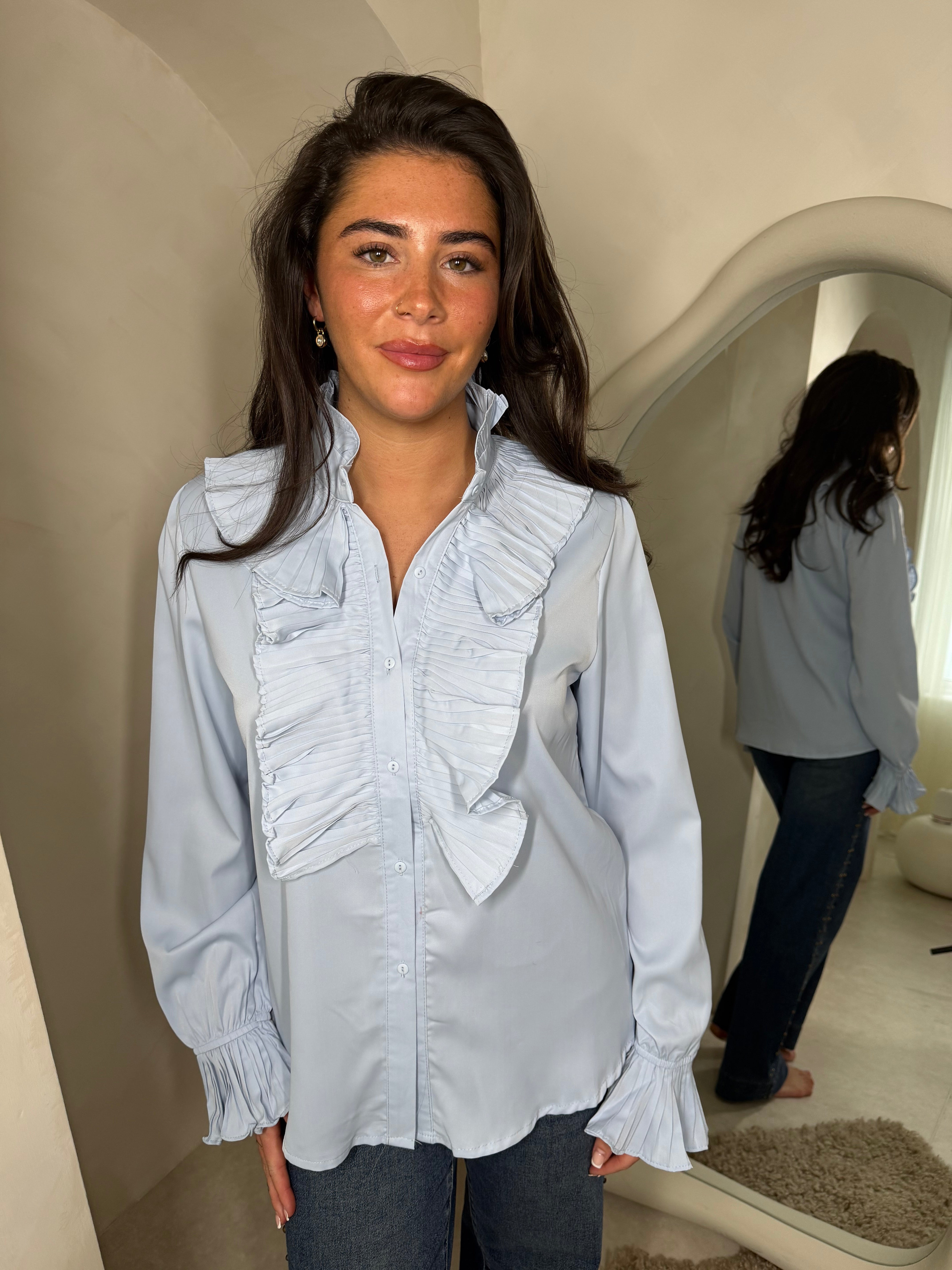 Frilly blouse in blue Main image