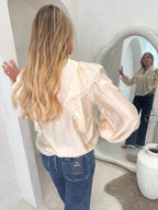 Frill blouse in cream
